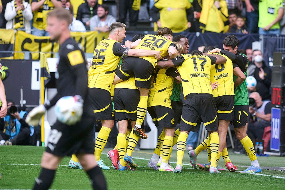 | Photo: Bernd Thissen/dpa via AP : Bundesliga 2024-25: Borussia Dortmund vs Holstein Kiel