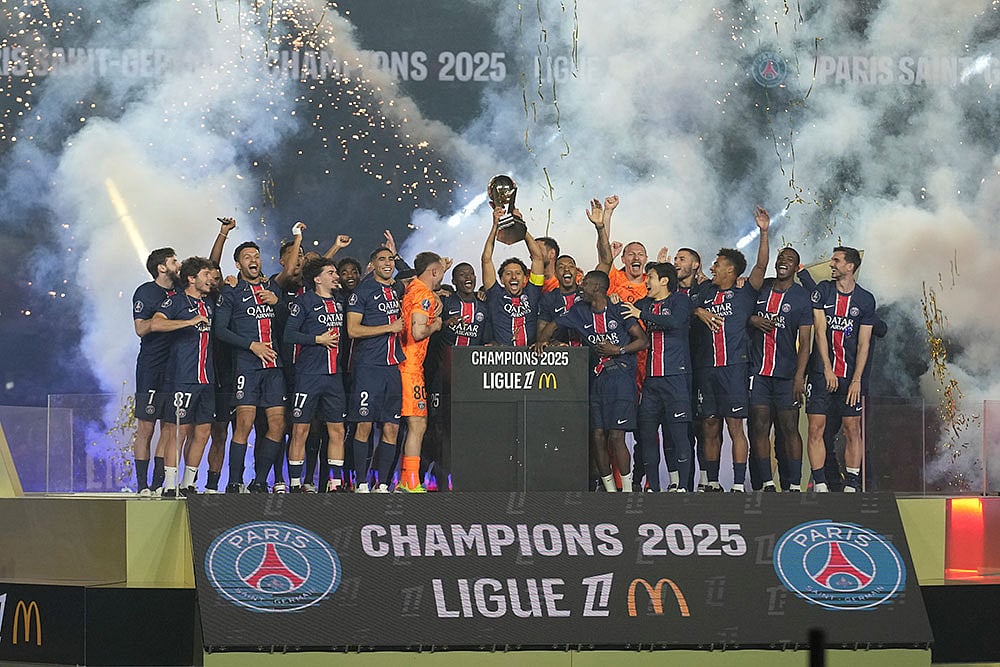 | Photo: AP/Christophe Ena : French League One: Paris Saint-Germain vs Auxerre