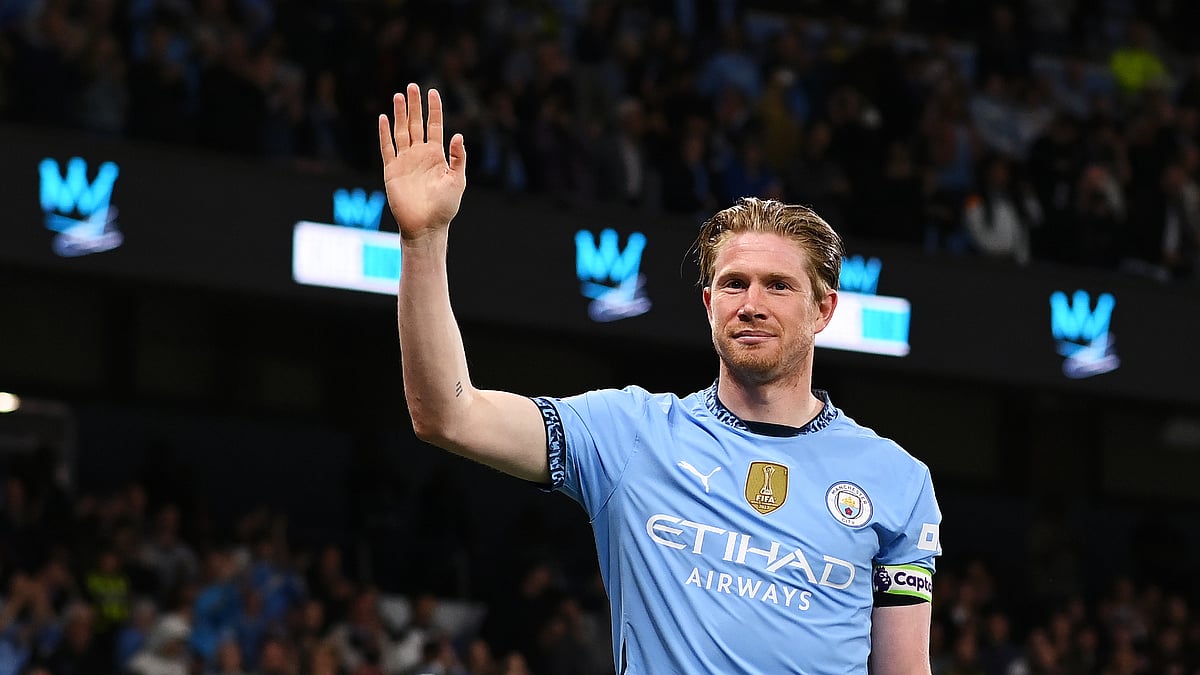 Kevin De Bruyne waves to Manchester City's fans after their win over Bournemouth