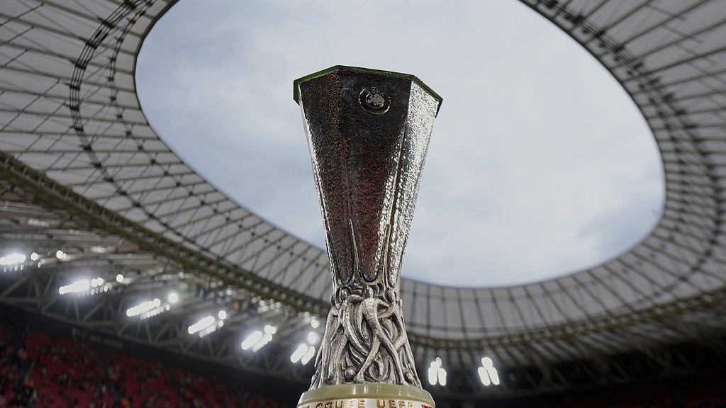 Photo: AP : The Europa League trophy is displayed on the pitch before the final match between Tottenham Hotspur and Manchester United at the San Mames Stadium in Bilbao, Spain.