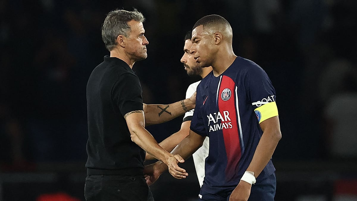 PSG head coach Luis Enrique with Kylian Mbappe in 2023-24.