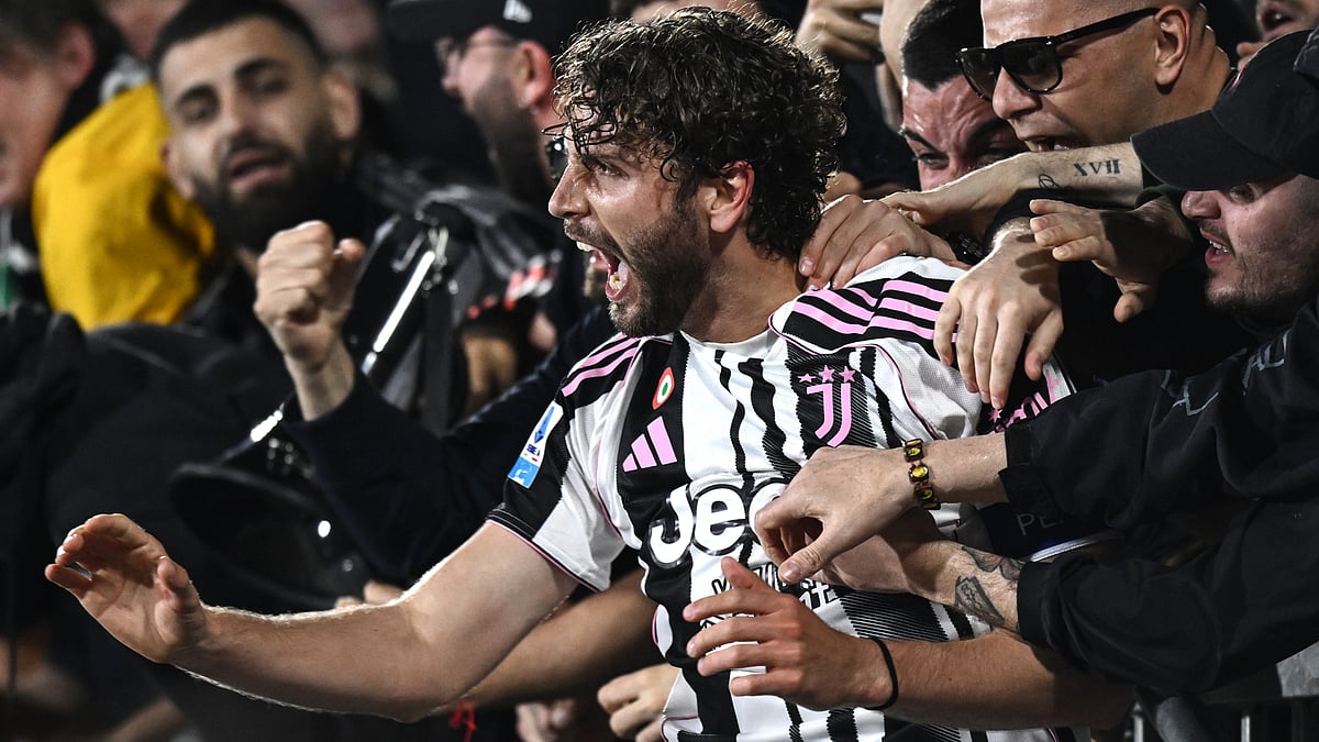 Manuel Locatelli celebrates with Juventus' fans.