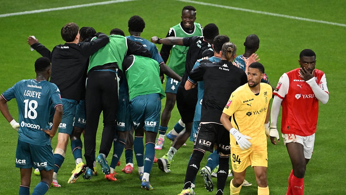 Metz celebrate in their play-off win.