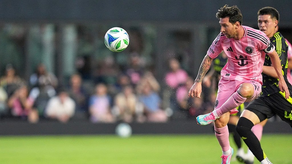 Photo: AP : Inter Miami forward Lionel Messi (10) scores his side's third goal against Columbus Crew during a Major League Soccer match in Fort Lauderdale, Florida.