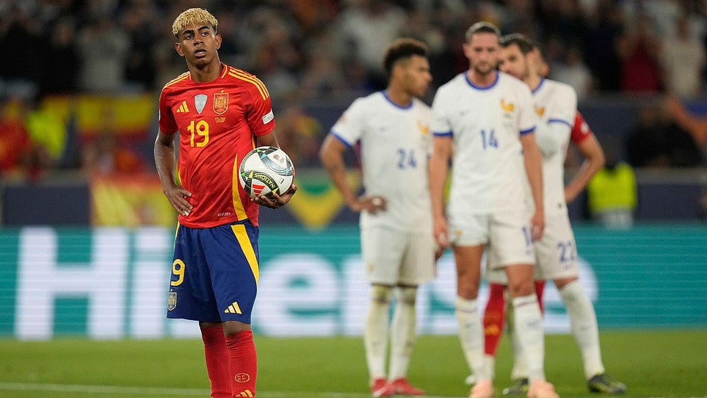AP : Spain's Lamine Yamal waits to take a penalty shot during the Nations League semifinal soccer match between Spain and France in Stuttgart.