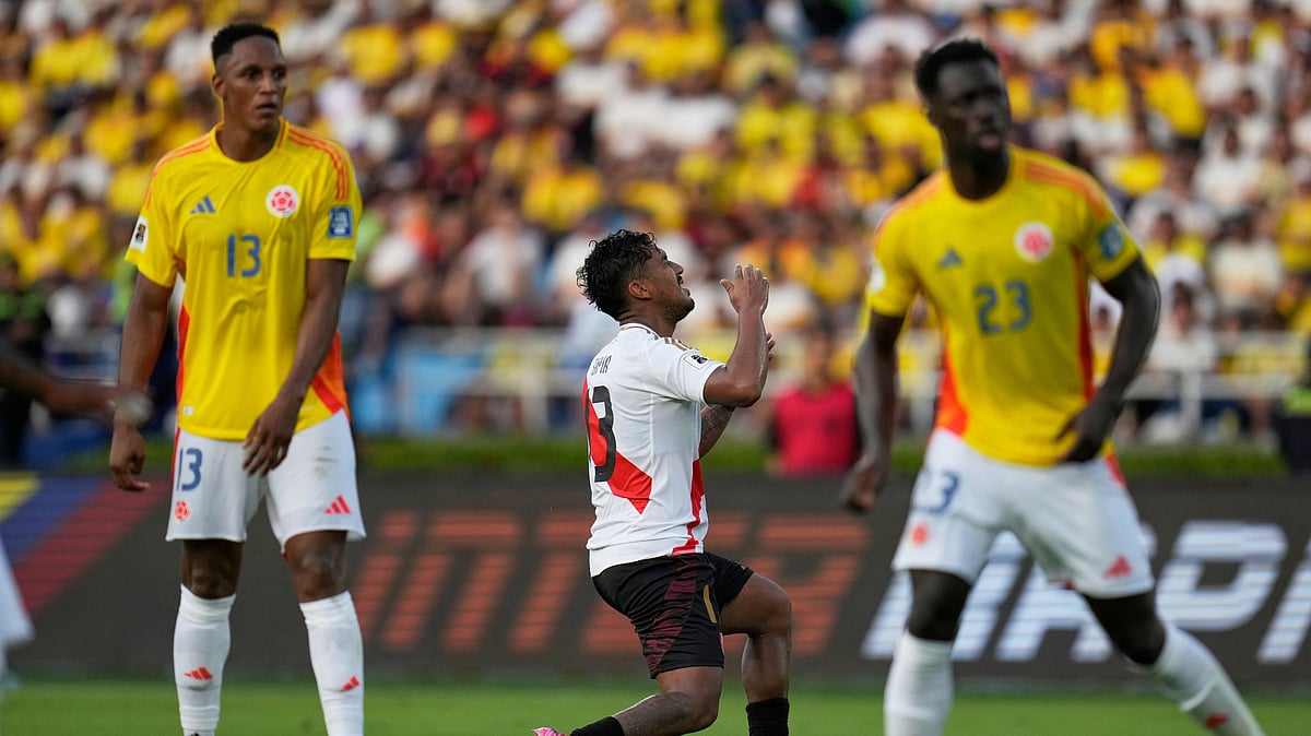 | Photo: AP/Fernando Vergara : Peru's Renato Tapia reacts after failing to score during a World Cup 2026 qualifying soccer match against Colombia at Metropolitano stadium in Barranquilla, Colombia, Friday, June 6, 2025.
