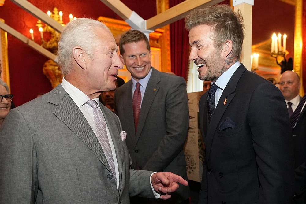 | Photo: AP/Kirsty Wigglesworth, Pool, File : Britain’s King Charles III and David Beckham