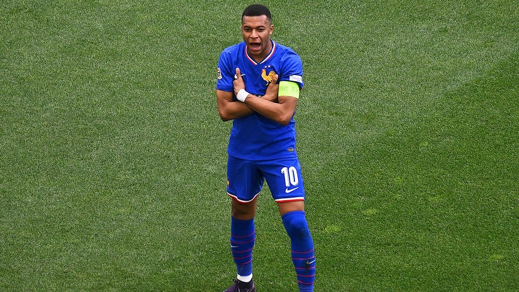 Photo: AP : France captain Kylian Mbappe celebrates after scoring the opening goal against Germany during their Nations League third-place match in Stuttgart, Germany.