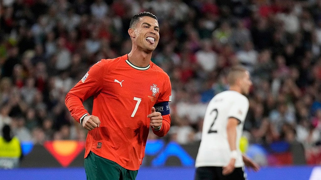 AP/Matthias Schrader : Cristiano Ronaldo in action for Portugal.