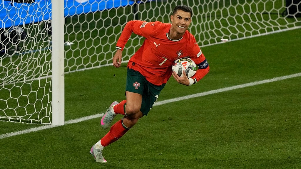 AP : Portugal's Cristiano Ronaldo celebrates after scoring his side's second goal against Spain during the Nations League final at the Allianz Arena in Munich, Germany.