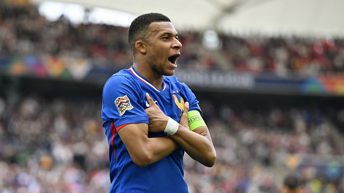 Kylian Mbappe celebrates for France