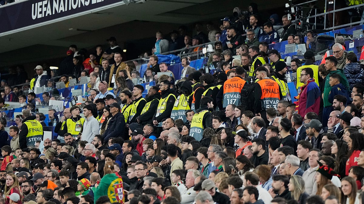 (AP Photo/Martin Meissner)

 : Match stewards form a line at the stands during the Nations League final soccer match between Portugal and Spain at the Allianz Arena in Munich, Germany, Sunday, June 8, 2025. 