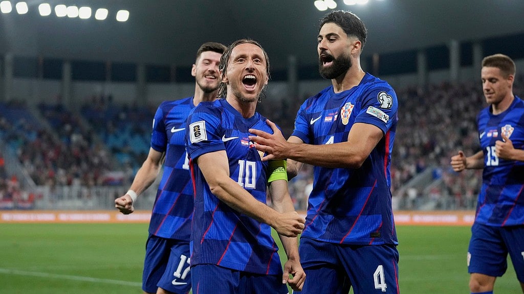 Photo: AP : Croatia's Luka Modric, front, celebrates with teammates after scoring his side's second goal during their FIFA World Cup 2026 group L qualifying match against Czech Republic at the Opus Arena in Osijek, Croatia.