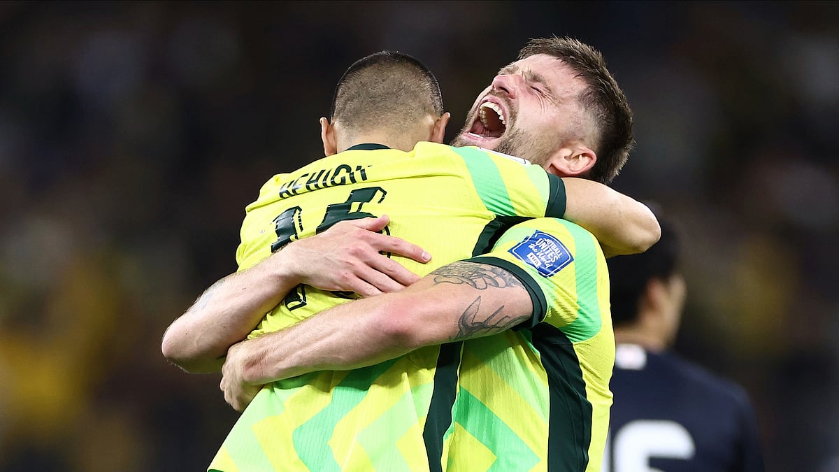 (AP Photo/Trevor Collens)

 : Australia's Cameron Burgess, right, and Aziz Behich celebrate after defeating Japan in their World Cup 2026 group C qualifying soccer match in Perth, Thursday, June 5, 2025. 