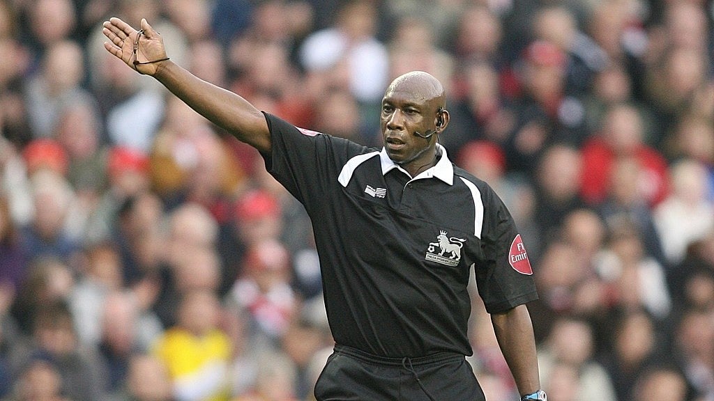  (Peter Byrne/PA via AP, File) : FILE - Premier League referee Uriah Rennie gestures in Liverpool, England, April 11, 2006.