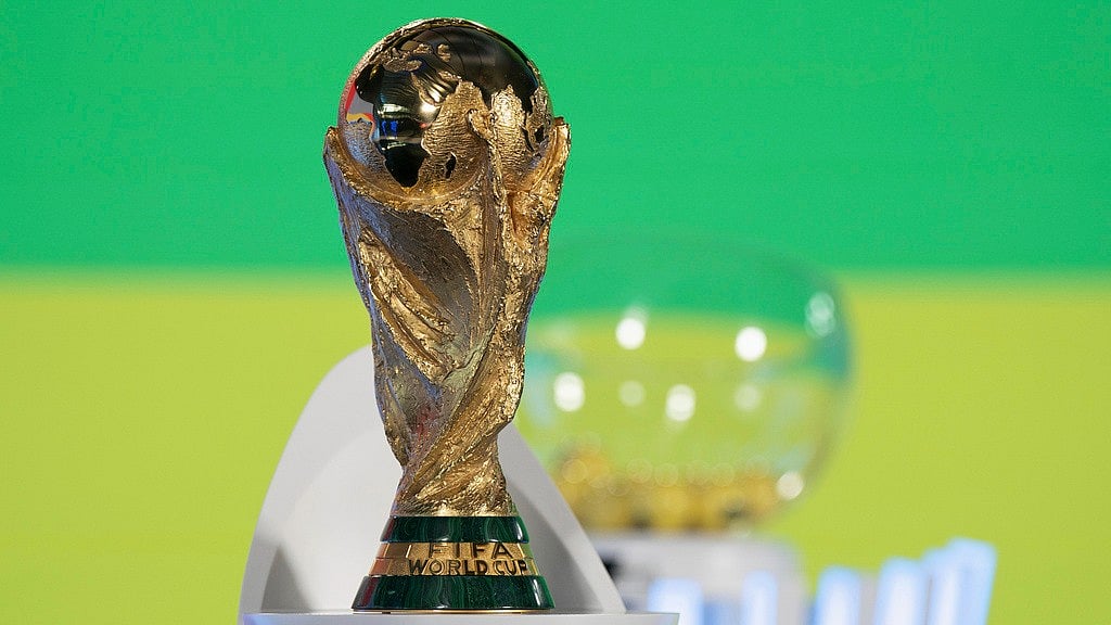 File/AP : The World Cup trophy is displayed before the UEFA preliminary draw for the 2026 FIFA World Cup tournament at FIFA headquarters in Zurich, Switzerland.