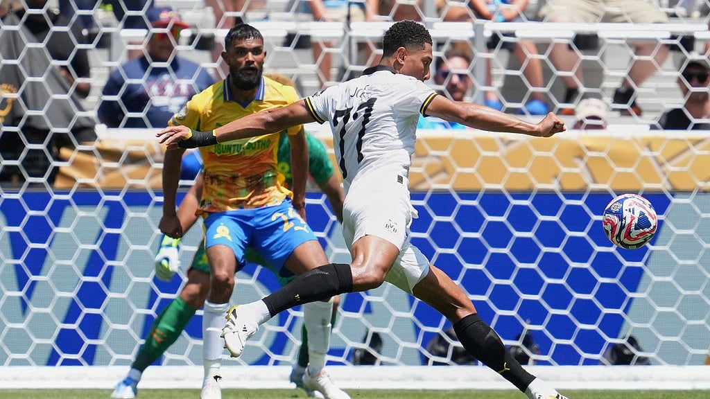 Photo: AP : Borussia Dortmund's Jobe Bellingham (right) scores during the FIFA Club World Cup Group F match against Mamelodi Sundowns in Cincinnati.
