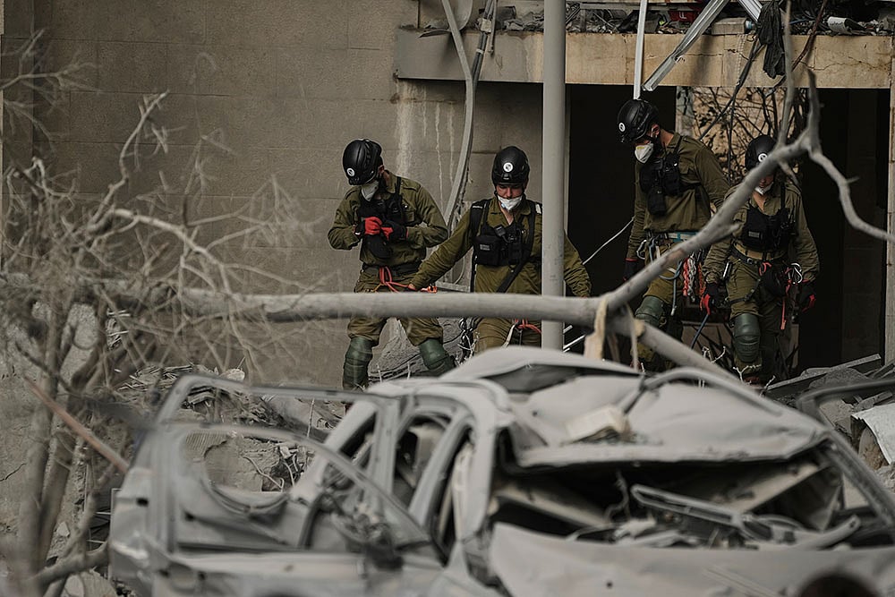 Photo: AP/Leo Correa : Iran Israel Missile War