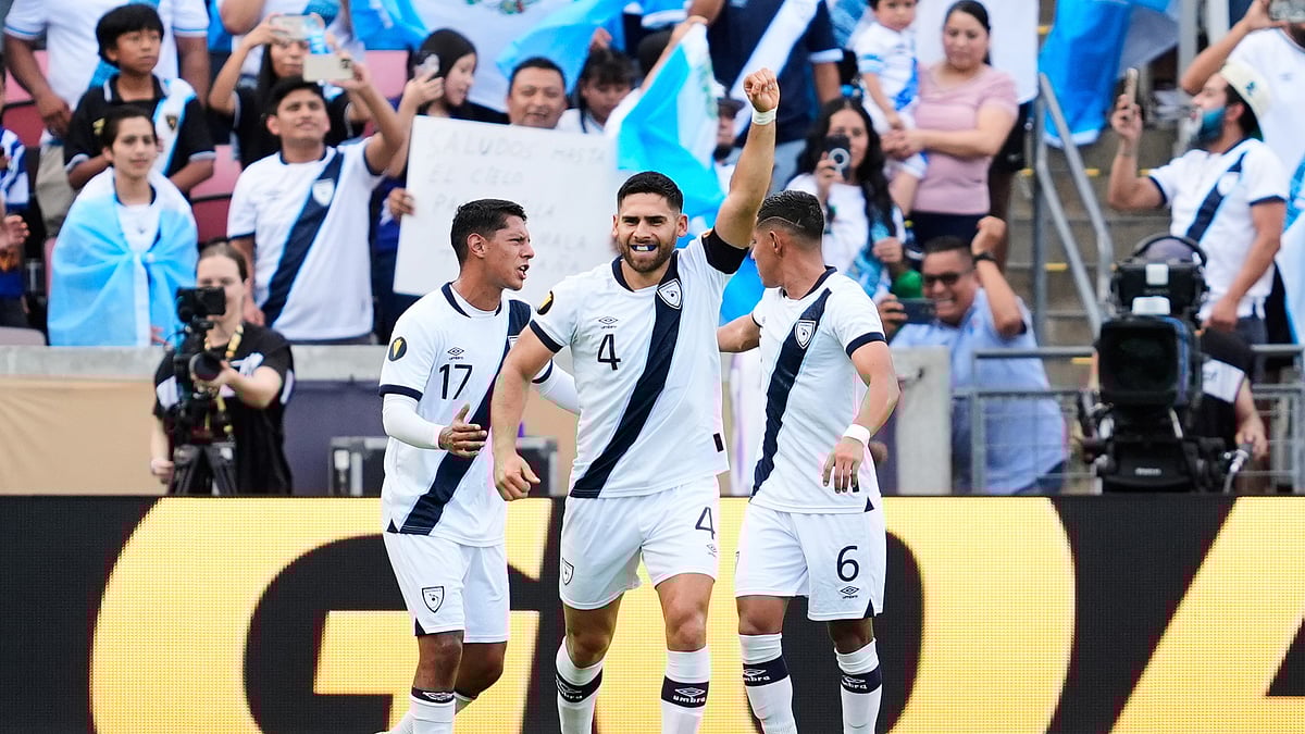 (AP Photo/Ashley Landis) : Guatemala defender Jose Pinto (4) celebrates after scoring his team's first goal during a CONCACAF Gold Cup soccer match against Guadeloupe in Houston, Tuesday, June 24, 2025.
