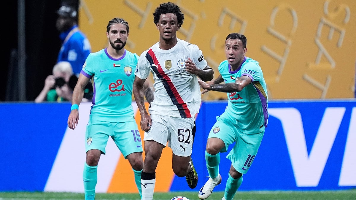 | Photo: AP/Mike Stewart : Wydad AC vs Al Ain, FIFA Club World Cup 2025: Oscar Bobb competes for the ball with Al Ain's Erik and Kaku during the Club World Cup Group G soccer match between Manchester City and Al Ain in Atlanta, Sunday, June 22, 2025.