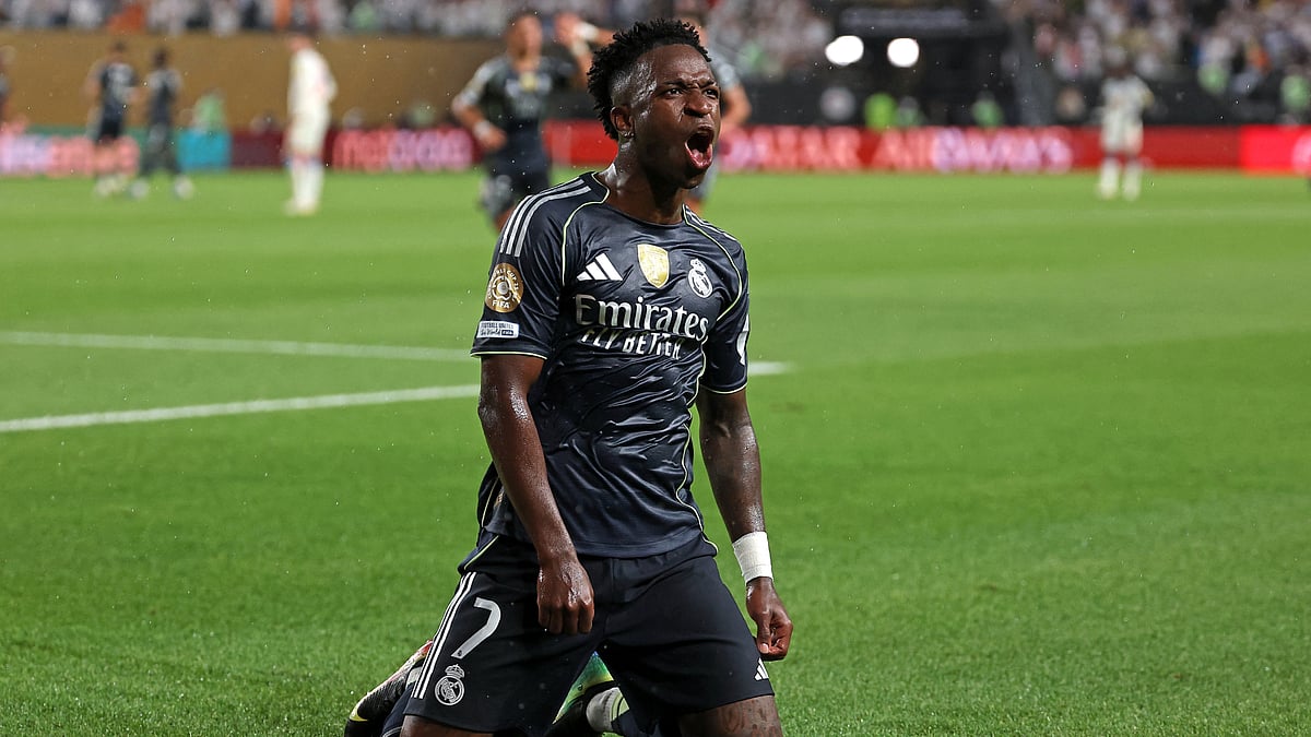 Vinicius Junior celebrates after opening the scoring against Salzburg.