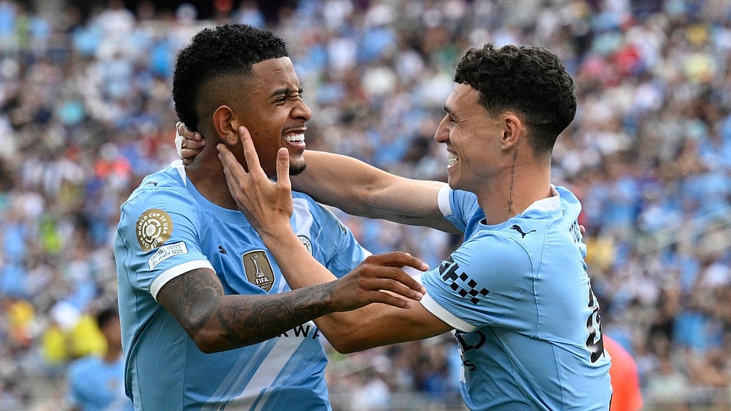 Photo: AP : Manchester City's Phil Foden, right, celebrates with teammate Savinho after scoring his side's fourth goal during the FIFA Club World Cup Group G match against Juventus in Orlando.