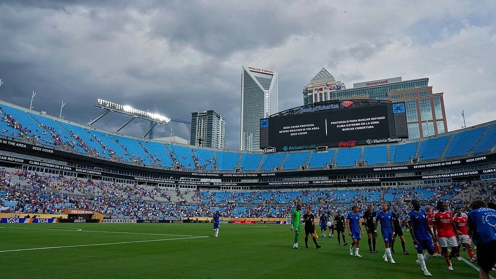 AP : Players walk off the pitch for a weather delay during the FIFA Club World Cup round of 16 match between Benfica and Chelsea in Charlotte, North Carolina.