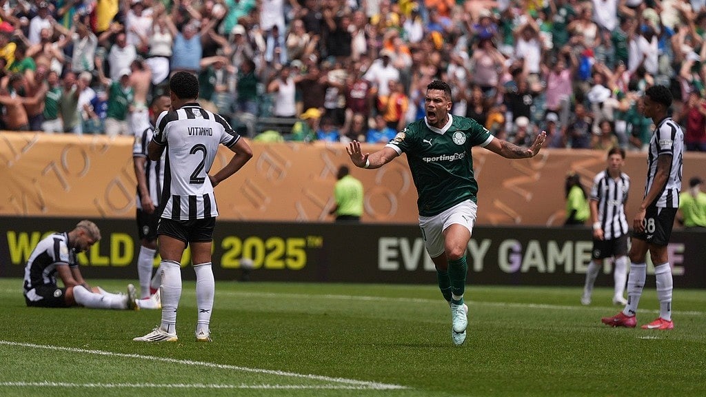AP : Palmeiras' Paulinho celebrates after scoring a goal during the FIFA Club World Cup round of 16 match against Botafogo in Philadelphia.
