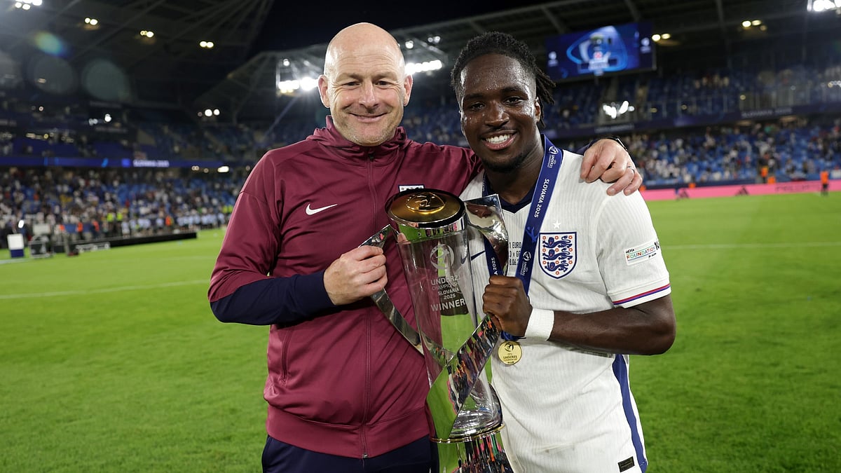 File : England Under-21s head coach Lee Carsley and match-winner Jonathan Rowe.