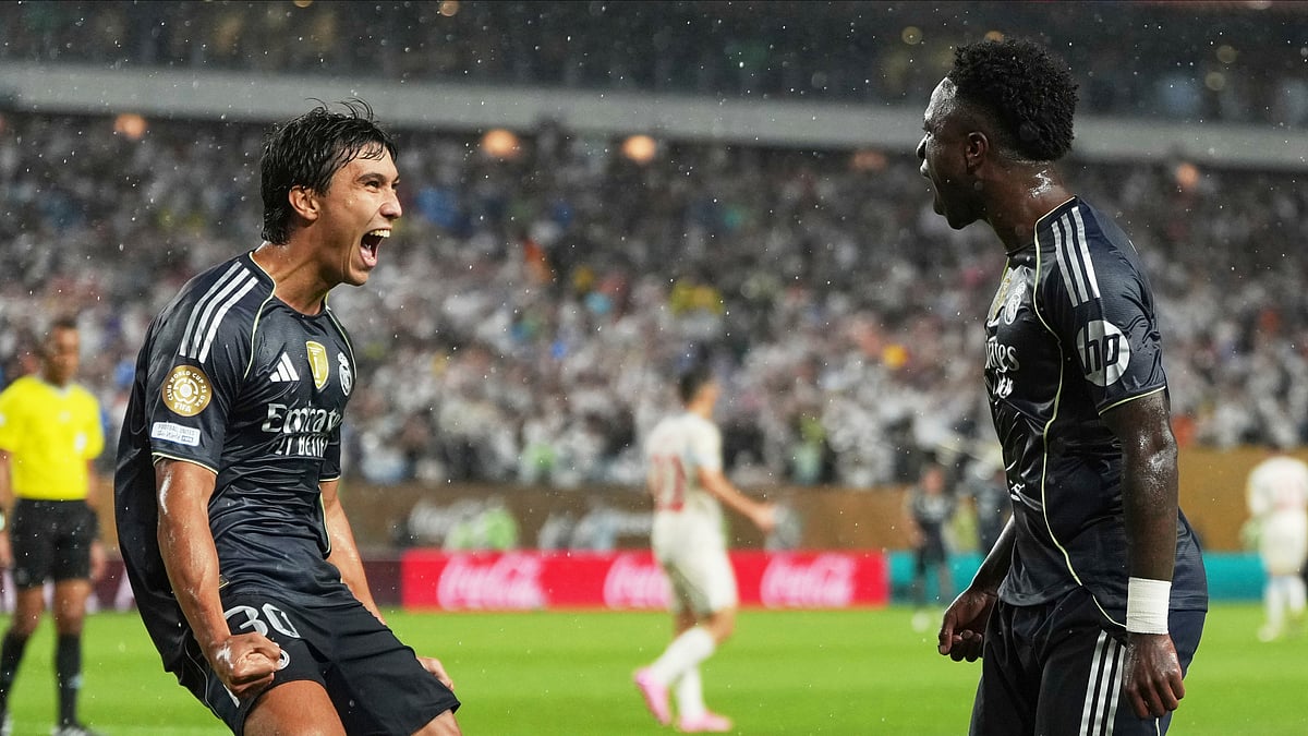  (AP Photo/Matt Slocum) : Real Madrid's Vinicius Junior celebrates with teammate Gonzalo Garcia, left, after scoring his team's first goal during the Club World Cup Group H soccer match between Salzburg and Real Madrid in Philadelphia, Thursday, June 26, 2025.

