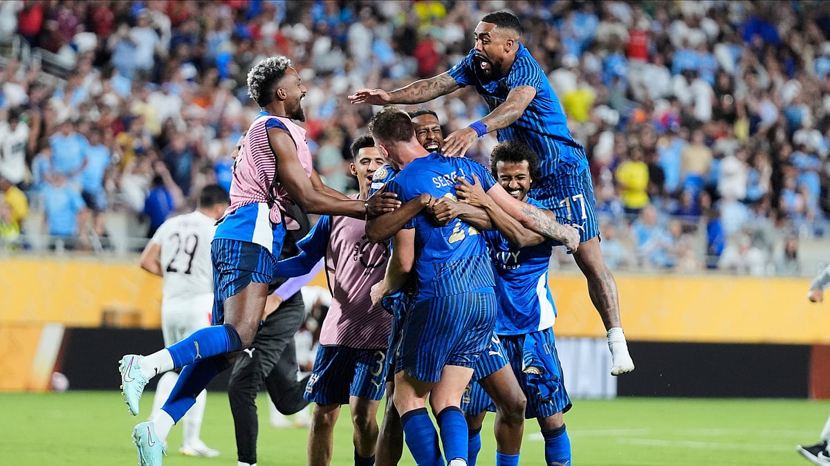 AP Photo/John Raoux : Al Hilal players celebrate following the Club World Cup round of 16 football match between Manchester City and Al Hilal in Orlando.