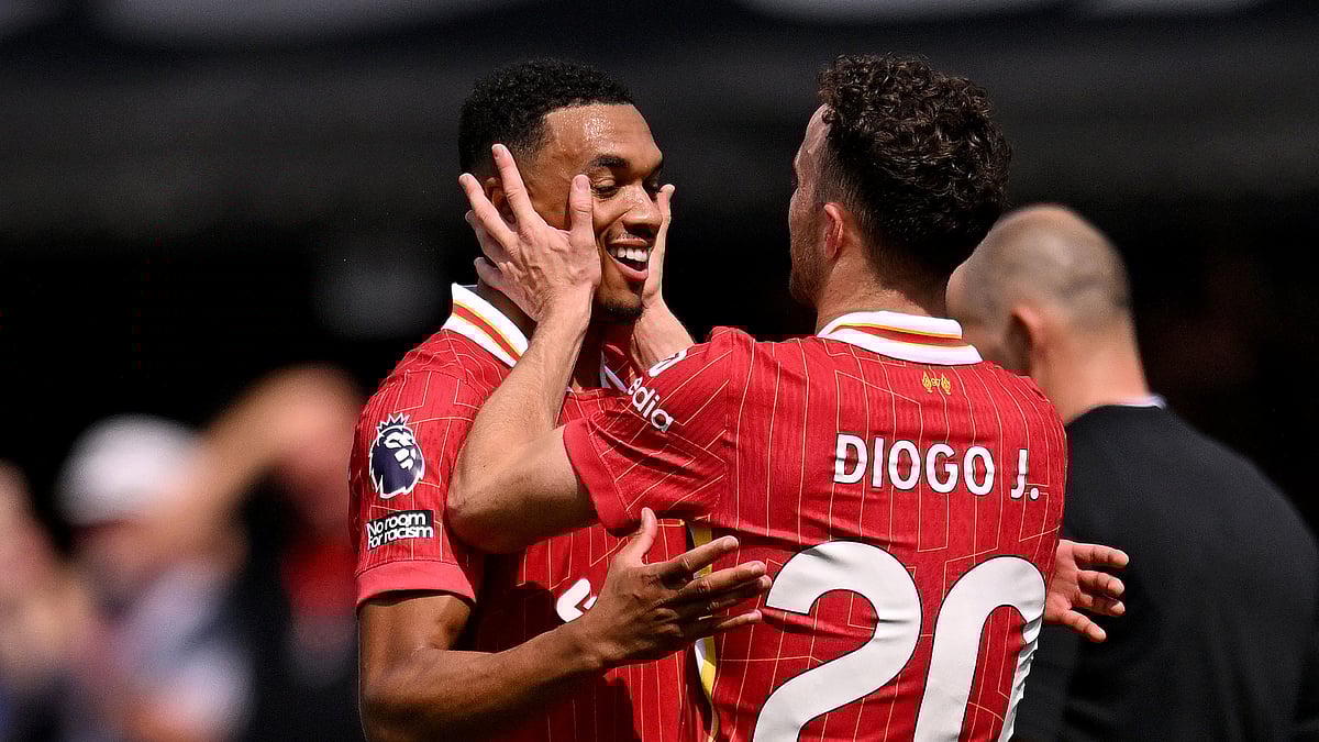 File : File photo of Trent Alexander-Arnold and Diogo Jota in action for Liverpool.