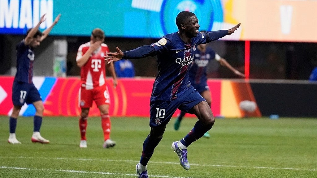 Photo: AP : Paris Saint-Germain's Ousmane Dembele celebrates after scoring his team's second goal during the FIFA Club World Cup quarter-final match against Bayern Munich in Atlanta.