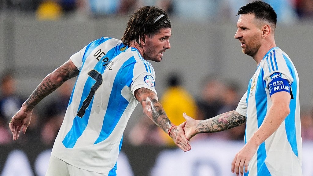 AP : Rodrigo De Paul (left) and Lionel Messi are Argentina teammates.