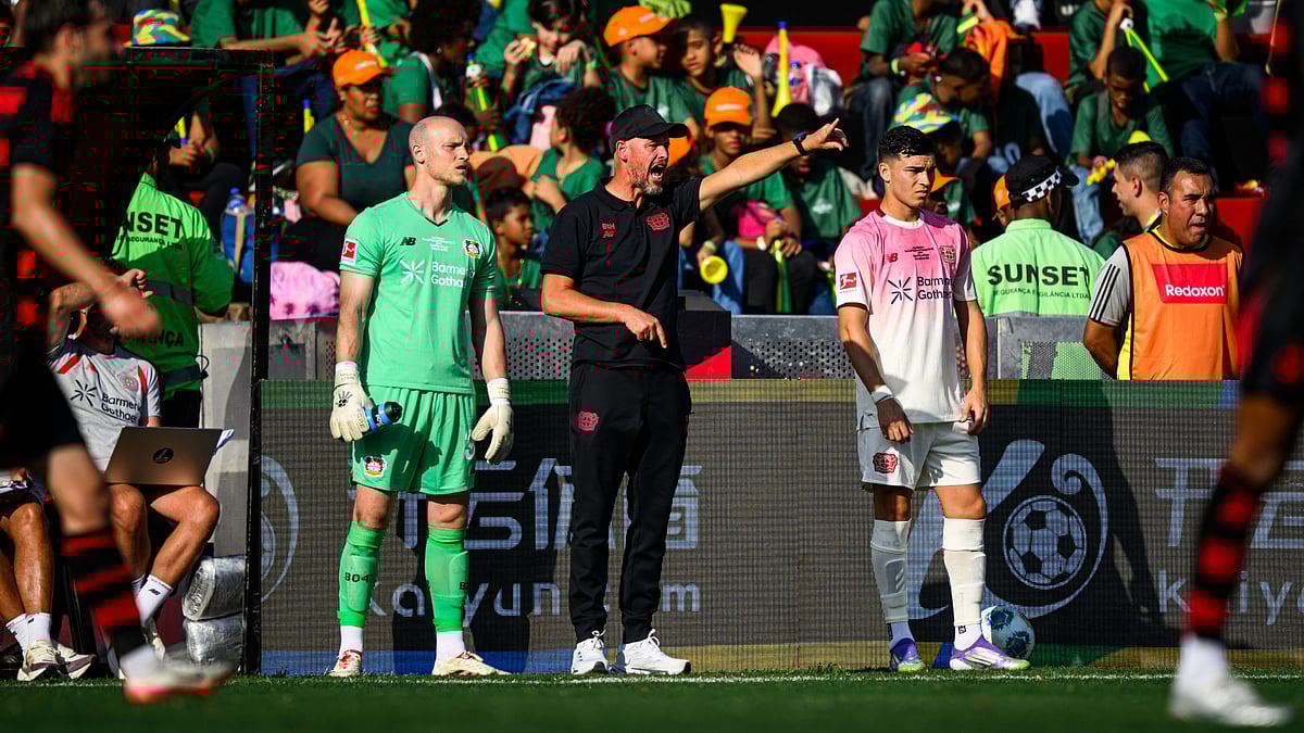 Erik ten Hag looks on from the touchline