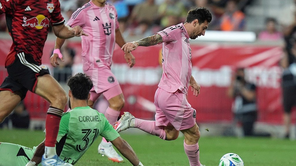 AP : New York Red Bulls Vs Inter Miami, Major League Soccer: Lionel Messi drives past goalkeeper Carlos Miguel Coronel to score a goal.