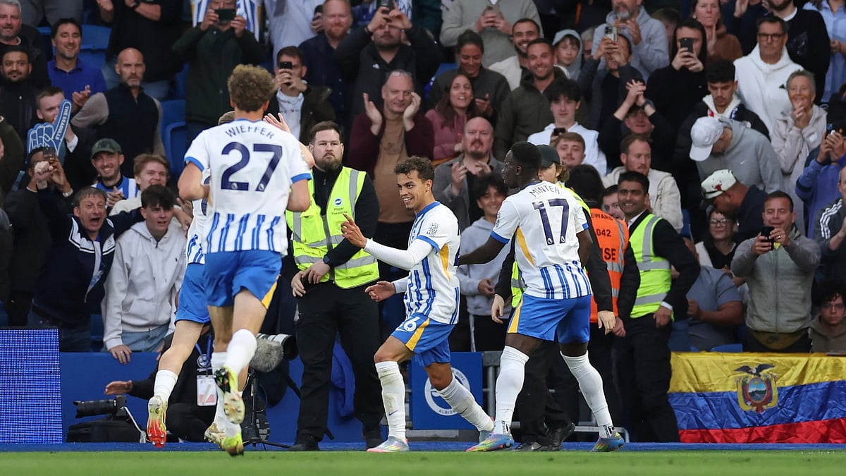 (AP Photo/Ian Walton) : Brighton's Yasin Ayari, centre, celebrates after scoring his side's opening goal during the English Premier League soccer match between Brighton and Liverpool at American Express Stadium in Brighton, England, Monday, May 19, 2025. 