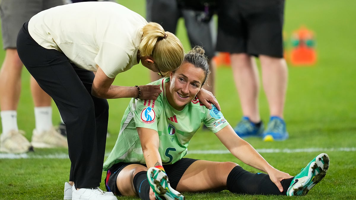 Lucy Bronze is congratulated by Sarina Wiegman after England's win over Italy.