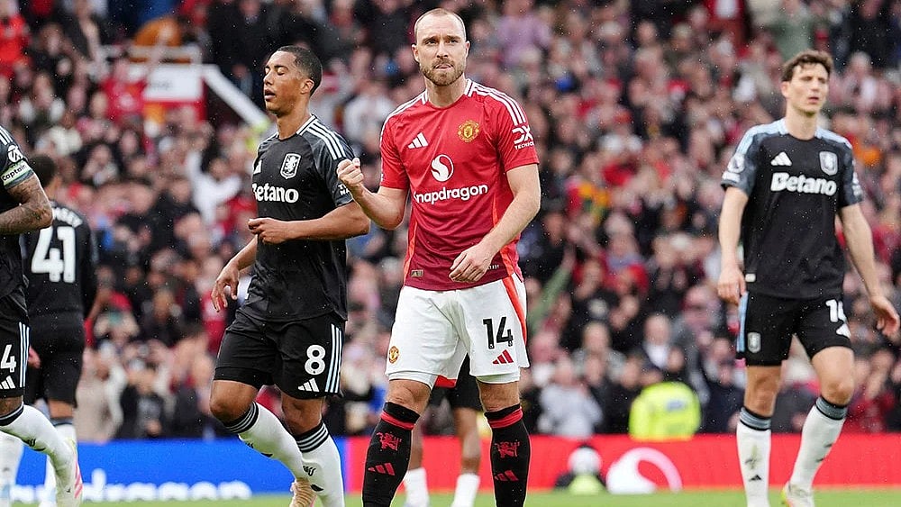 | Photo: Martin Rickett/PA via AP : File photo of Manchester United player Christian Eriksen in English Premier League action against Aston Villa.
