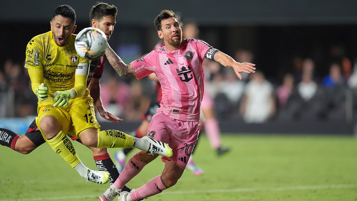| Photo: AP/Rebecca Blackwell : Atlas goalkeeper Camilo Vargas (12) and Inter Miami forward Lionel Messi (10) collide, as Atlas defender Roberto Suarez, runs to defend, during the second half of a Leagues Cup group stage soccer match, Wednesday, July 30, 2025, in Fort Lauderdale, Fla.