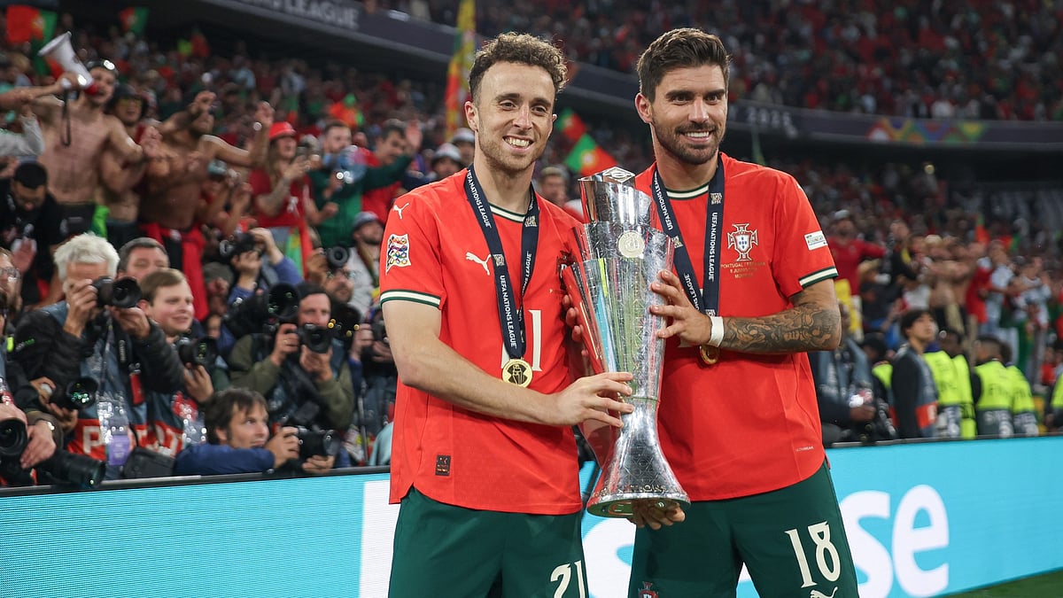 Ruben Neves and the late Diogo Jota celebrate Portugal's Nation League win in June.