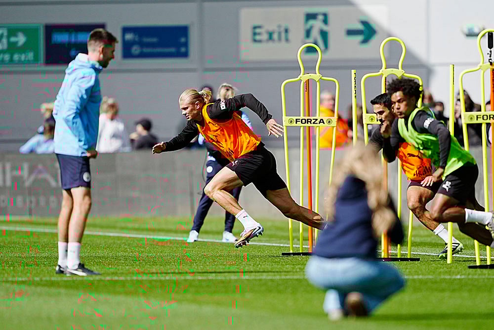 | Photo: Peter Byrne/PA via AP : Manchester City Training