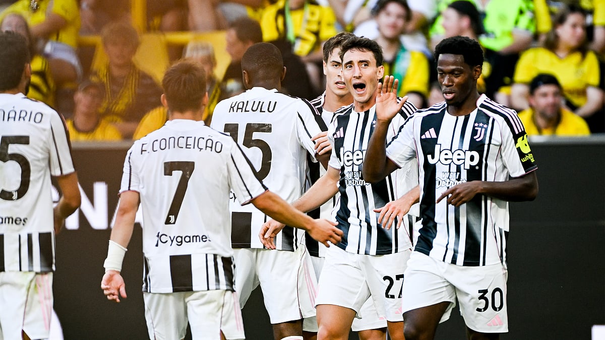 Juventus' players celebrate a goal from Andrea Cambiaso