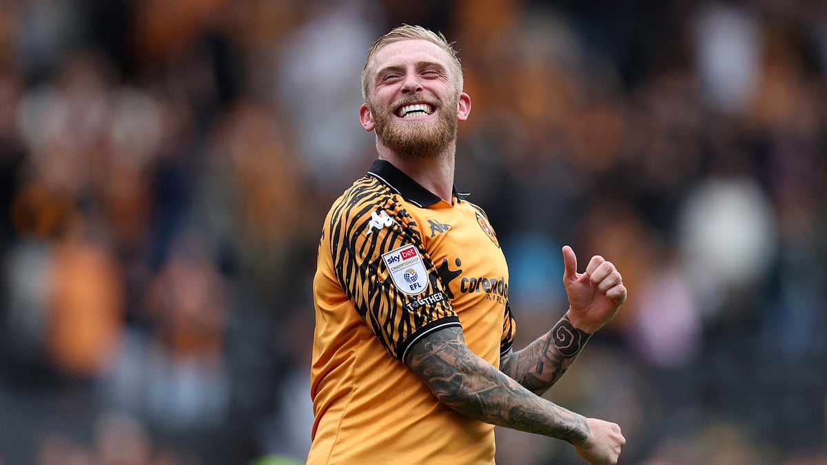 Oli McBurnie celebrates at the full-time whistle