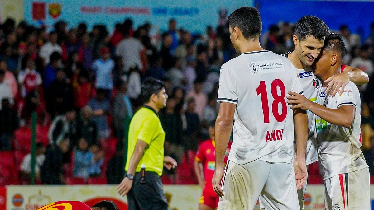 X/thedurandcup : NorthEast United players (in white) celebrate at Full-time.