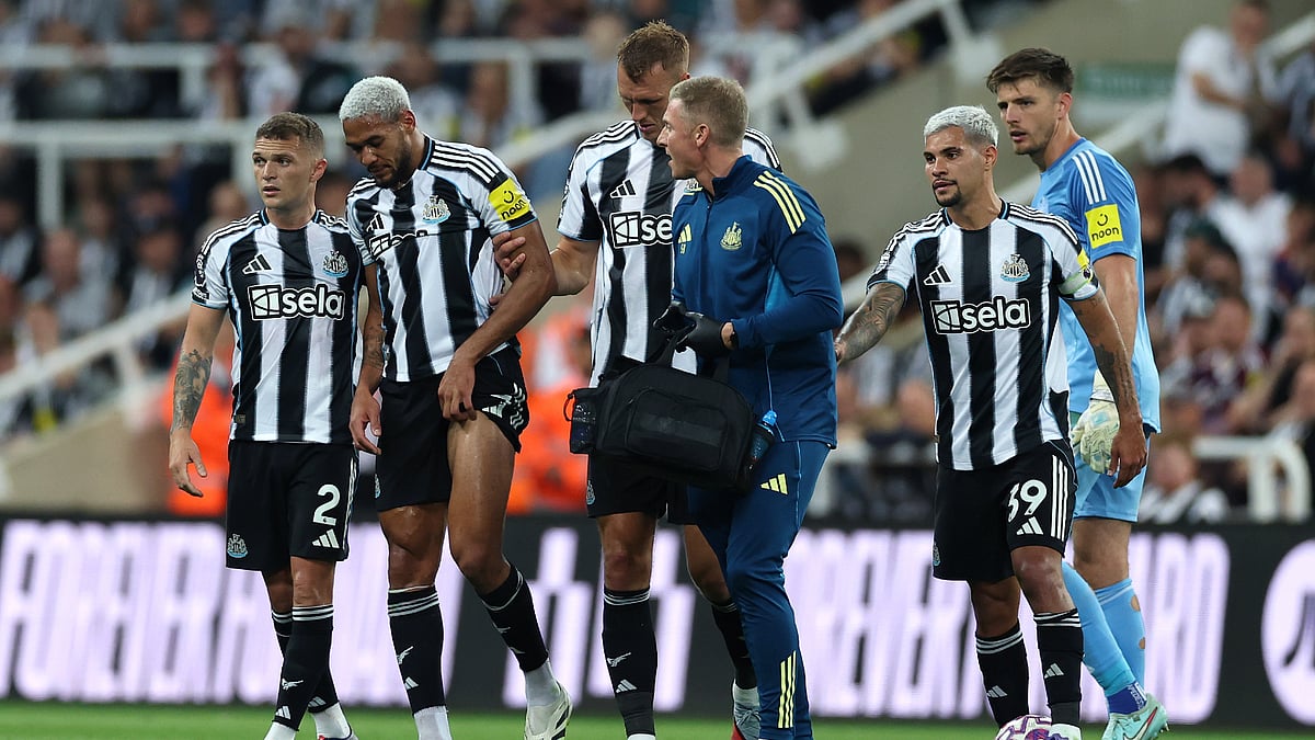 File : File photo of Joelinton limping off the pitch against Liverpool.