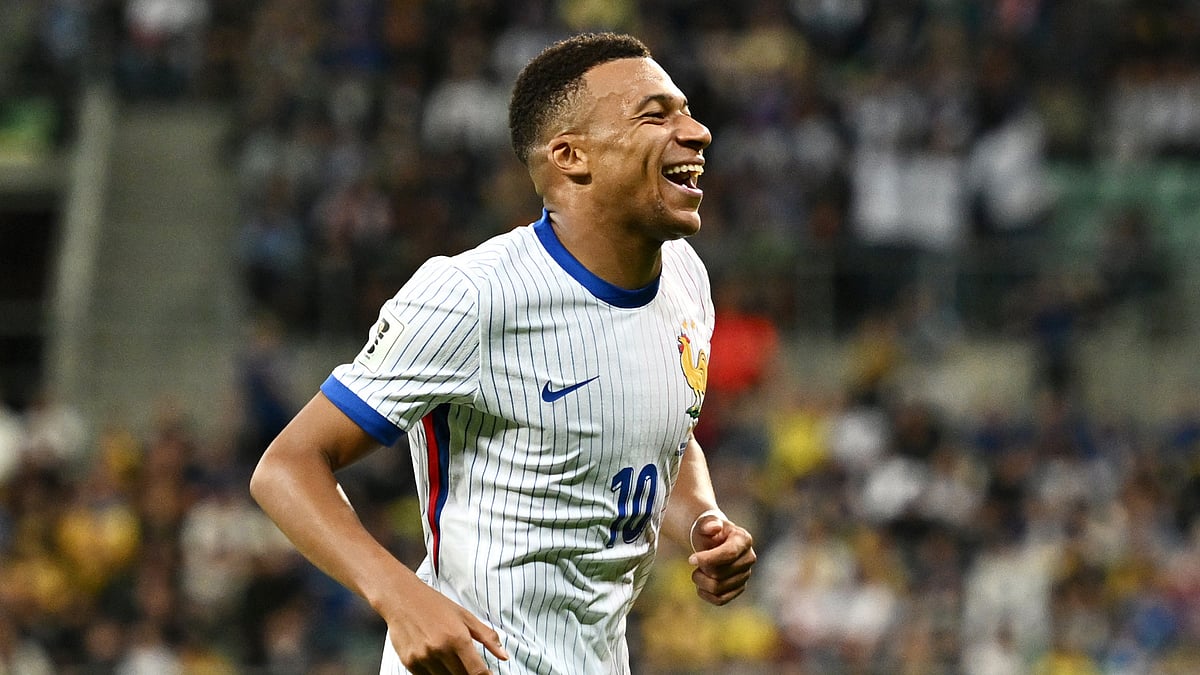 Kylian Mbappe celebrates for France