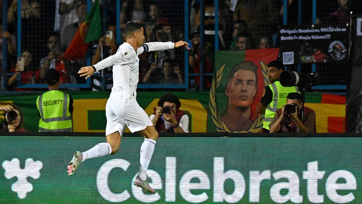 (AP Photo/Hakob Berberyan) : Portugal's Cristiano Ronaldo celebrates after scoring his side's second goal during a World Cup 2026 group F qualifying soccer match between Armenia and Portugal at the Vazgen Sargsyan stadium in Yerevan, Armenia, Saturday, Sept. 6, 2025.