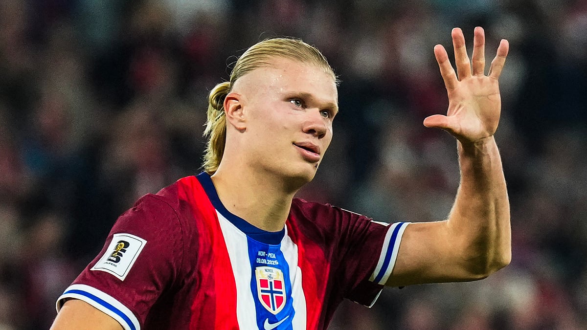 Erling Haaland celebrates after scoring five goals against Moldova.
