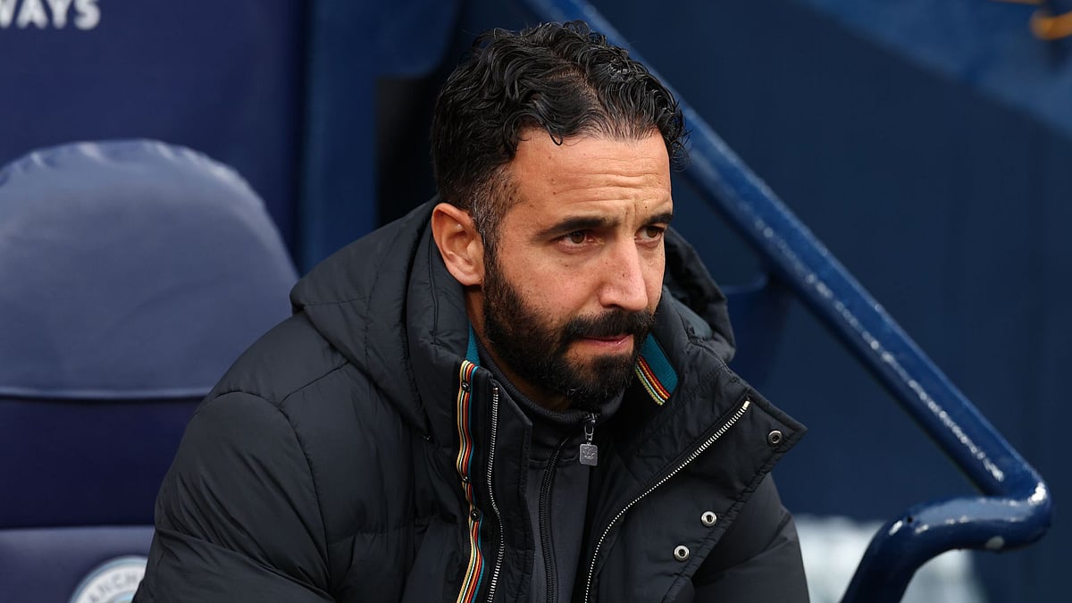 Amorim looks on during Man Utd's defeat at Man City